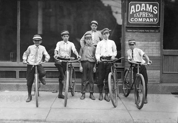 A typical group of Postal Messengers. Smallest on left end June 1911