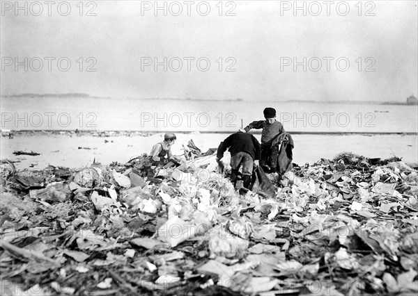 Boys of the dumps. South Boston. Fields now being filled in for a play ground. Boston, Mass, October 1909