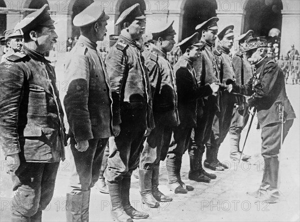 General Cousin decorates Russian prisoners at the Invalides ca. 1915