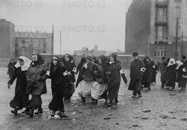 Russian nurses walking across a plaza on their way to a funeral during World War I ca. 1914-1915