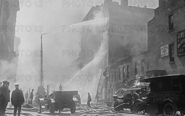 A 'Bellevue Hospital' ambulance at scene of the Rogers Ink Works fire (Rodgers Ink Works fire) ca. May 5, 1915