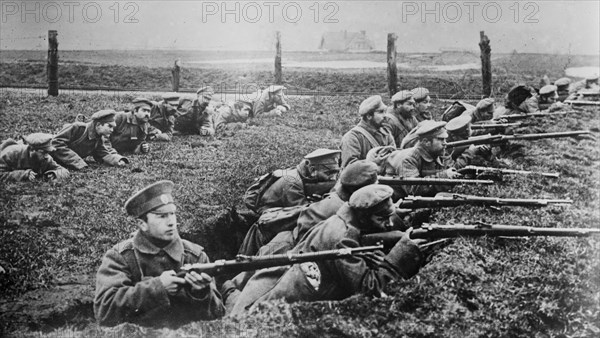 Russian soldiers with guns in trenches during World War I ca. 1915