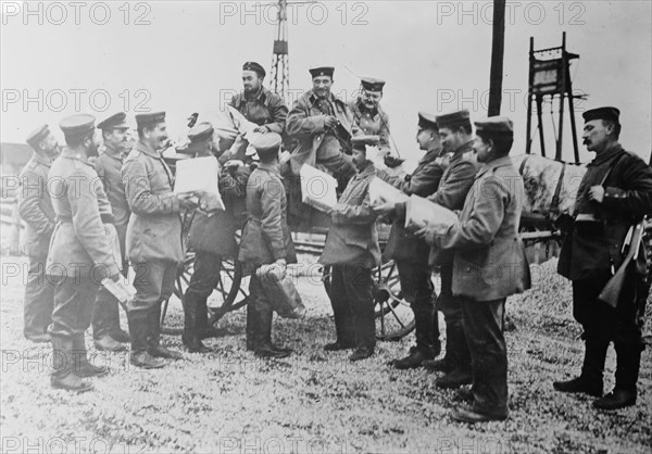 Arrival of gifts for German soldiers during World War I, possibly at Christmas ca. 1914-1915