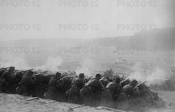 French soldiers firing from a trench at the beginning of World War I ca. 1914-1915