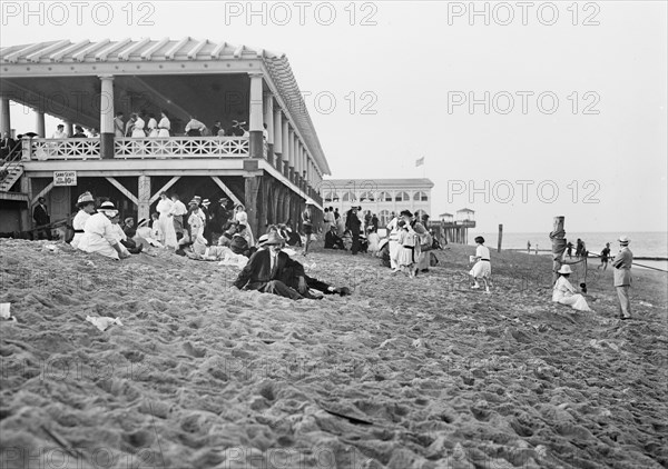 People enjoying a day on the beach in Asbury Park, NJ ca. 1910-1915