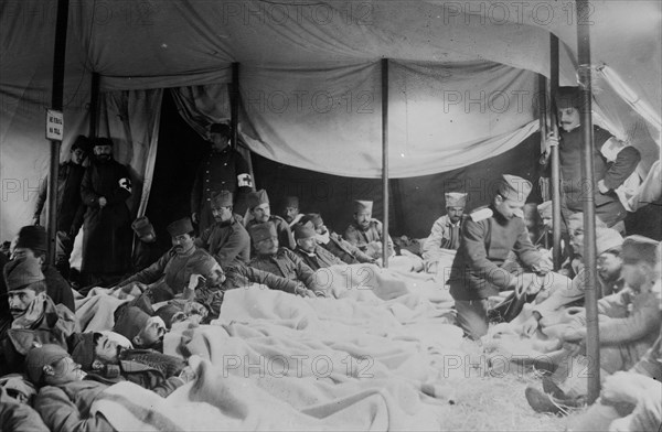 Serbian Red Cross workers with wounded soldiers probably during the first Balkan War (October 1912-May 1913)