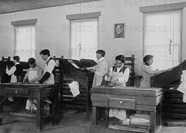 students at United States Indian School, Carlisle, PA in the printing shop ca. 1910-1915