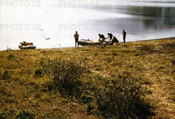 7/12/1973 - Preparing to launch river exploration - Surprise Lake