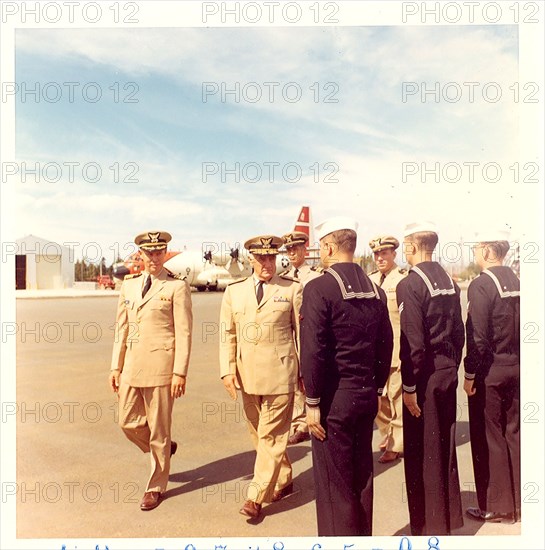 Air Station Annette, Alaska Original photo caption: 'USCG Air Station Annette Isl., Alaska, Inspection tour Admiral E. J. Roland, USCG, commandant, dedicating new family quarters. Admiral Roland inspecting crew here.'; photo dated 28 July 1965