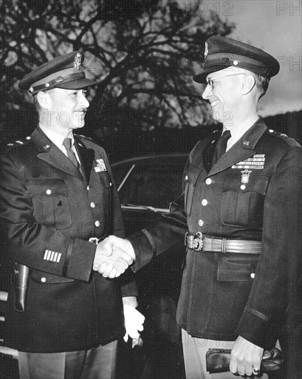 General Medaris, (left) who was a Commander of the Army Ballistic Missile Agency (ABMA) in Redstone Arsenal, Alabama, during 1955 to 1958, shakes hands with Major General Holger Toftoy (right) ca. early 1950s