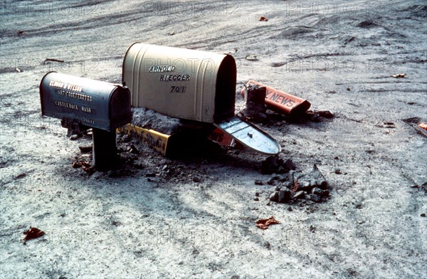 This photo was taken on July 15, 1980 which shows the after-effects of the Mount St. Helens eruption. Here we see mudflow almost to the top of the mailbox posts near Cowlitz River in Cowlitz County, Washington.