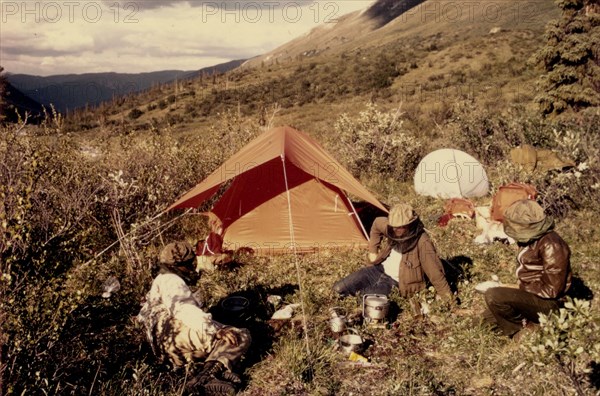 July 1972 - Camping - Brooks Range Alaska - Mosquito Camp - campers wearing protective head gear.