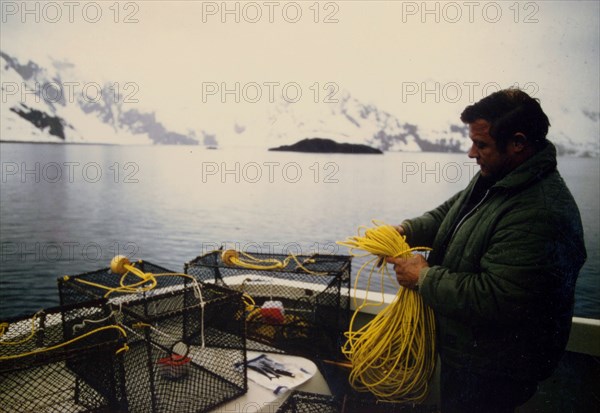 May 1973 - Fishmerman setting his shrimp pots, Aialik Bay, Kenai Fjords, Alaska