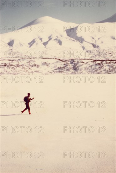 March 1976 - Ski touring on the frozen snow covered surface of Kulik Lake, Katmai National Monument, Alaska