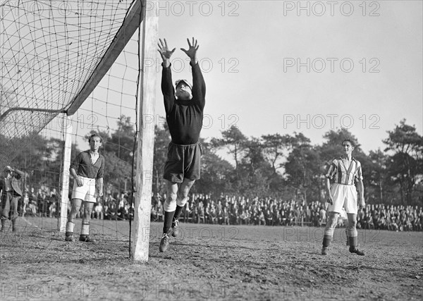 1940s men's soccer match - House high over at AGOVV goal October 10, 1947