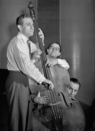 Portrait of Jack Lesberg, Max Kaminsky, and Peanuts Hucko, Eddie Condon's, New York, N.Y., ca. May 1947