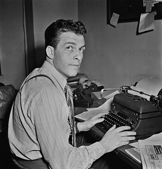 Portrait of Eddie Ronan, Down Beat office, New York, N.Y., ca. Mar. 1947