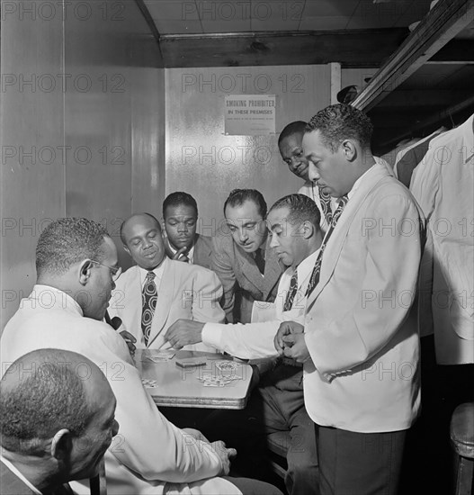 Portrait of Al Sears, Shelton Hemphill, Junior Raglin, Django Reinhardt, Lawrence Brown, Harry Carney, and Johnny Hodges, Aquarium, New York, N.Y., ca. Nov. 1946