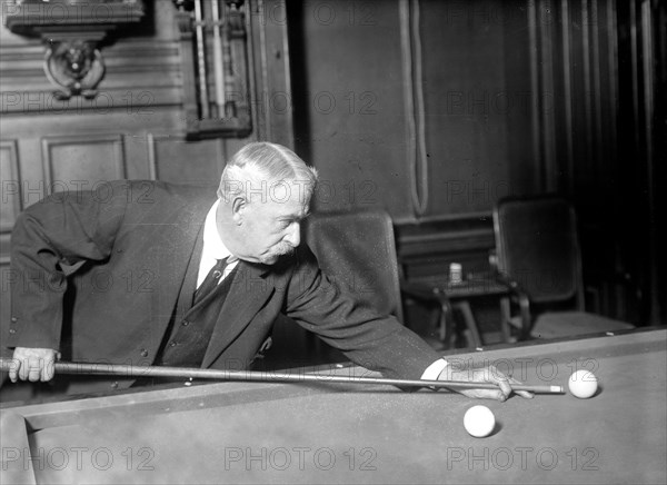 Photo shows Edward W. Gardner playing billiards, possibly at championship game with Edouard Roudil, reported in New York Times, Feb. 18, 1912.