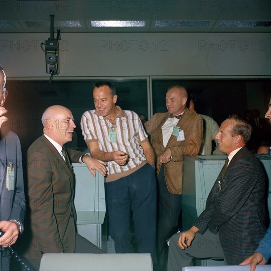 (15 Nov. 1966) Dr. Robert R. Gilruth (right), with astronauts, from the left, Charles Conrad Jr., John H. Glenn Jr. and Alan B. Shepard Jr. in Houston's Mission Control Center during the Gemini-12 mission.