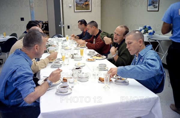 Fellow astronauts join the Gemini-7 prime crew for breakfast in the Manned Spacecraft Operations Building, Merritt Island, on the day of the Gemini-7 launch.