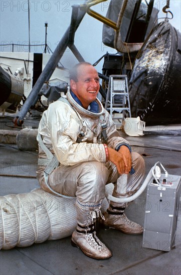(23 July 1966) Astronaut Charles Conrad Jr., prime crew command pilot of the Gemini-11 spaceflight, relaxes on deck of the NASA Motor Vessel Retriever after suiting up for water egress training in the Gulf of Mexico.