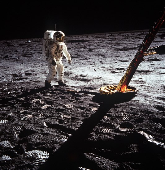 (20 July 1969) Astronaut Edwin E. Aldrin Jr., lunar module pilot, walks on the surface of the moon near a leg of the Lunar Module during the Apollo 11 extravehicular activity (EVA).