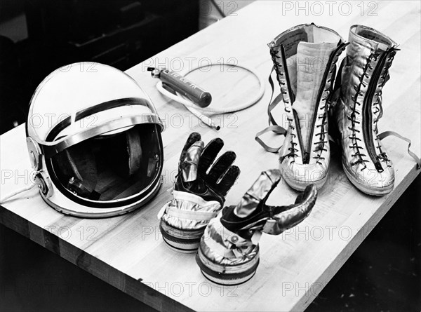 (28 July 1961) Table top view of some of the Mercury suit components including gloves, boots and helmet.