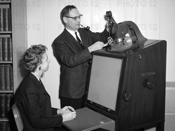 Library Staff operate a Microfilm Reader at the Lewis Research Center ca. 1961