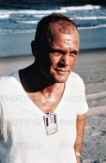 Astronaut John Glenn running as part of physical training program