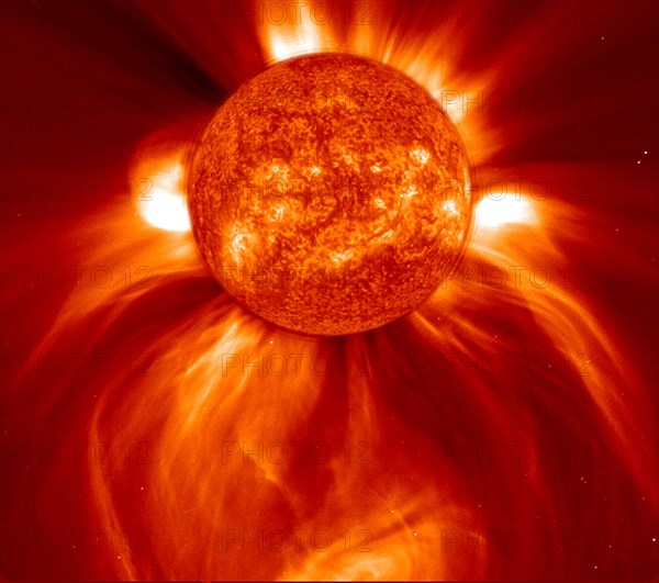 This LASCO C2 image, taken 8 January 2002, shows a widely spreading coronal mass ejection (CME) as it blasts more than a billion tons of matter out into space at millions of kilometers per hour