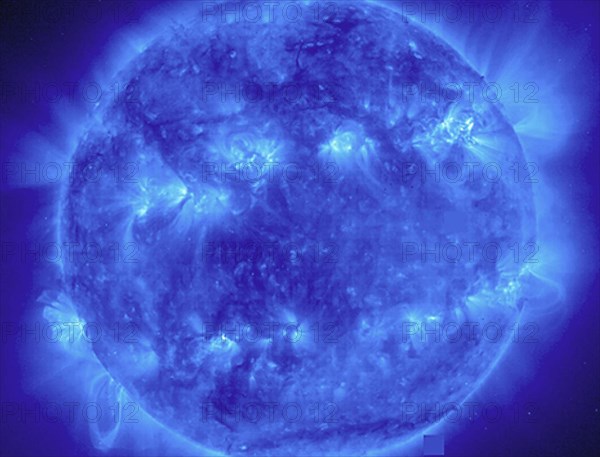 This EIT 171 image shows a wide variety of loops and active regions (lighter areas on the surface). Taken on November 9, 1998. The 171 filter shows emission from 8 and 9 times ionized iron at about 1 million degrees C.