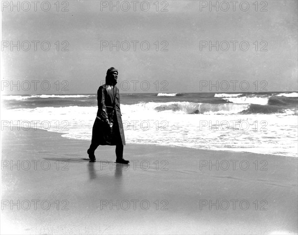 USCG Surfman patrols the beach at the Pea Island Lifeboat Station during World War II