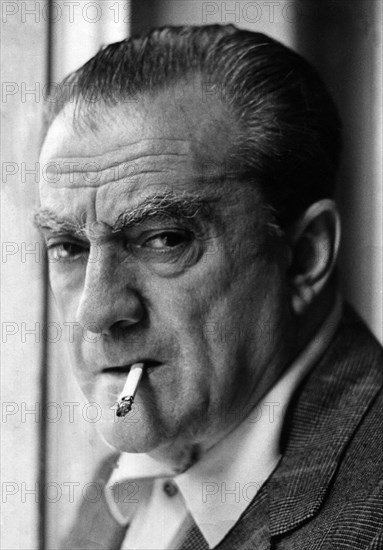 Luchino Visconti smoking a cigarette ca. 1972