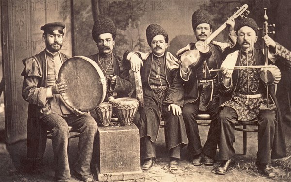 The ensemble of the famous tarista Mirza Sadykh (Sadykhdzhan) (from right to left): Kamyanchist Baghdagul Ata oglu, Sadykhdzhan, Hanande Bulbuljan, nagarist Huseynbala, performer on the vas Vaso Kikialishvili ca. 1878