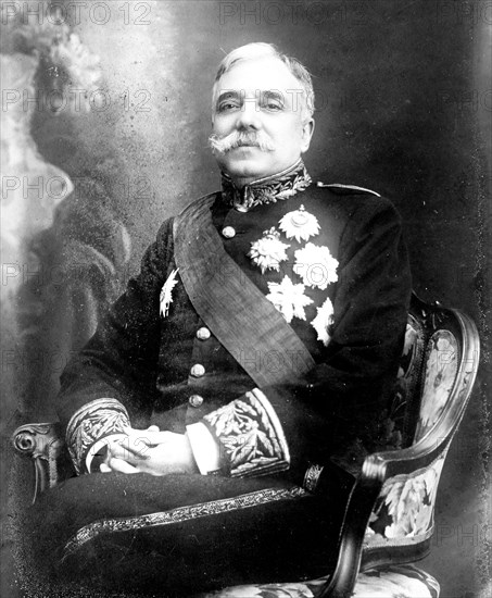 Campos Henriques, Minister of Justice, Portugal, seated, in uniform