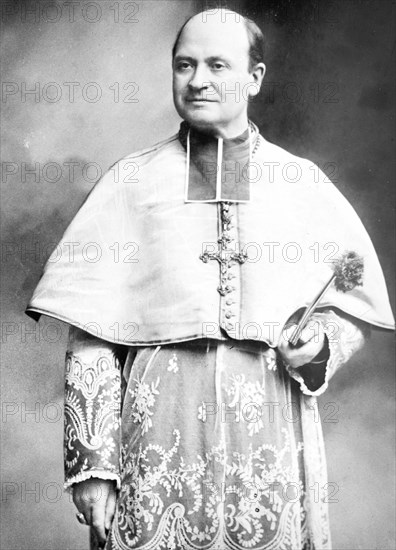 Cardinal Amette, standing three-quarters