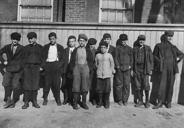 The very smallest boy is Henry Fournier, has worked 2 months in spinning room, October 1911