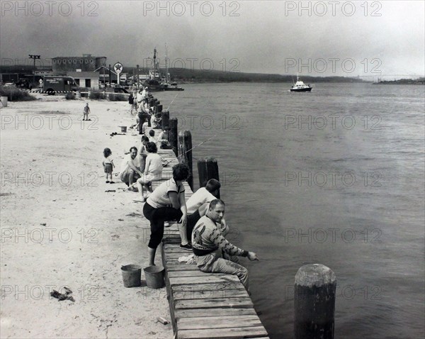 Fishing along Sandwich Bulkhead area, Cape Cod Canal 8/26/1961