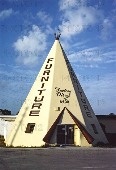 1970s America -  United Furniture Sales teepee, Pinellas Park, Florida 1979