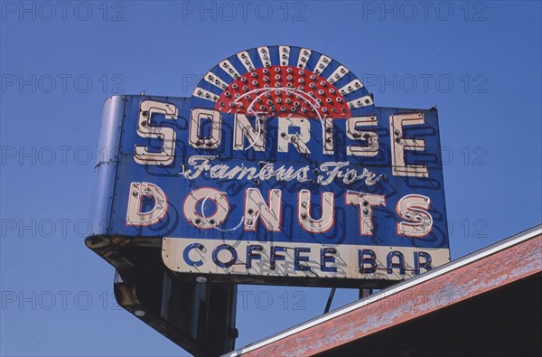 2000s America -  Sunrise [ie Sonrise] Donuts neon sign, Springfield, Illinois 2003