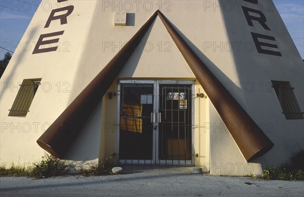 1970s America -  United Furniture Sales teepee, Pinellas Park, Florida 1979