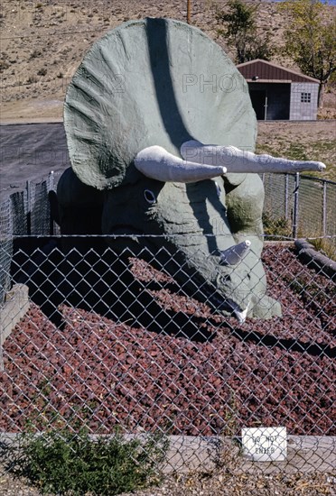 1990s United States -  Triceratops statue, public park, Route 40, Dinosaur, Colorado 1991