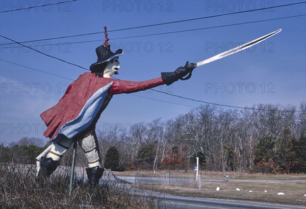 1980s America -  Rene's Casa Basso Restaurant statue, Quogue, New York 1989