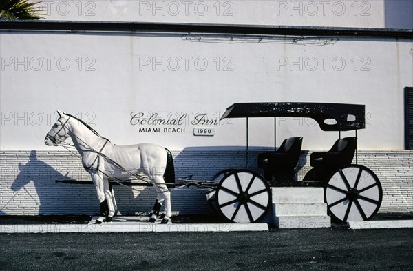 1990s United States -  Colonial Motel statue, Sunny Isles, A-1A, North Miami Beach, Florida 1990