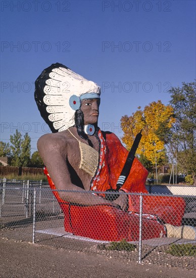 1990s United States -  Moqui Indian Trading Post, Route 40, statue sign, Roosevelt, Utah 1991