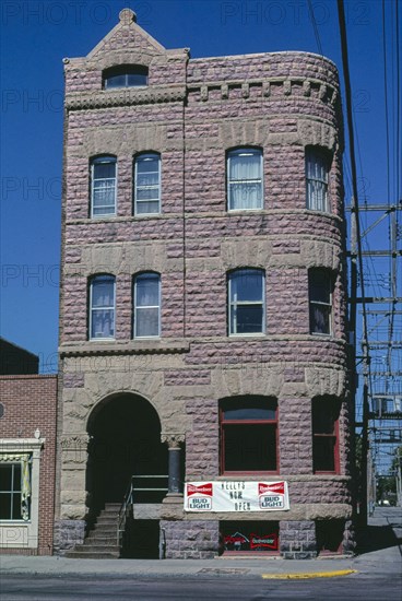 1980s United States -  Yankton National Bank, Keley's Bar, front, car at right, Third Street, Yankton, South Dakota 1987