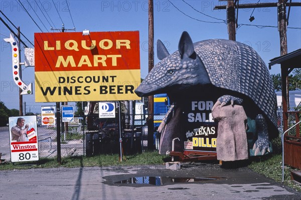 1980s America -   Armadillo sign float, San Antonio, Texas 1982