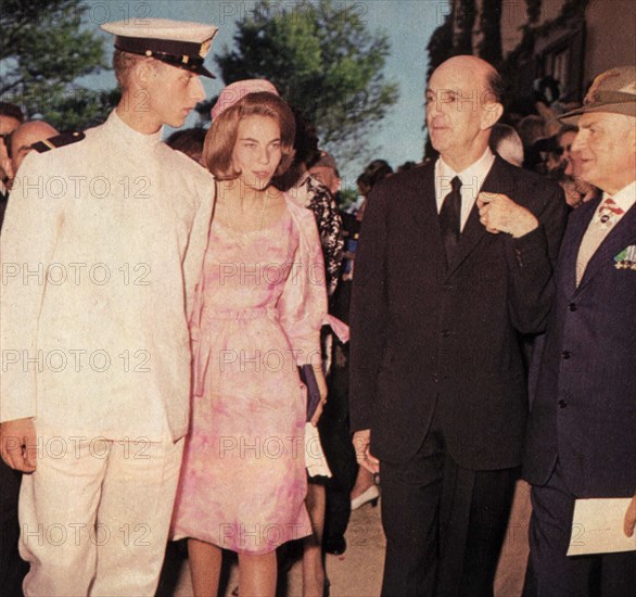 Amedeo di Savoia Aosta and Claudia d'Orléans entertain with Umberto II of Savoia on the eve of their wedding celebrated on 22 July 1964