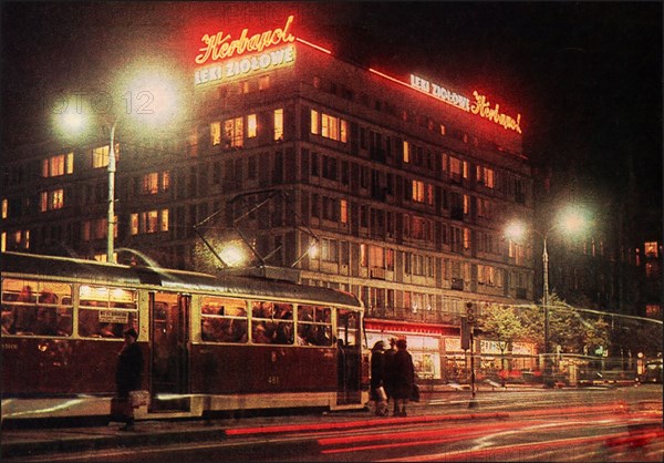 Marszalkowska Street Scene, with tram at night in front of an apartment building in Warsaw ca. 1968